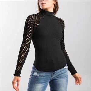 Free People Clementine mock neck top. NWT
